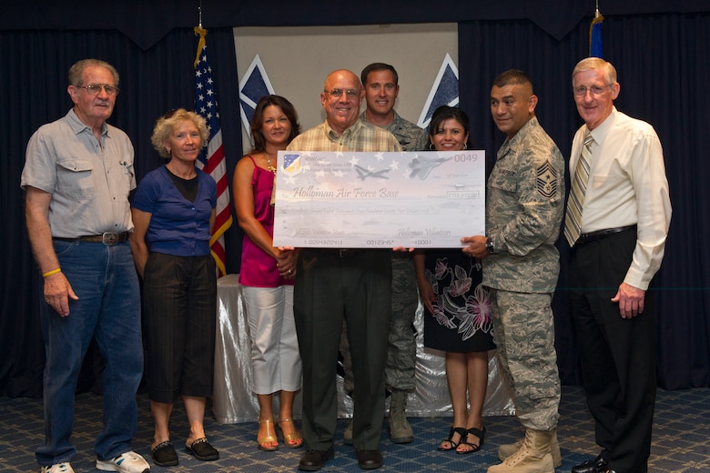 Airmen And Family Readiness Center Members Gather For A Photo At Schriever Air Force Base Colorado