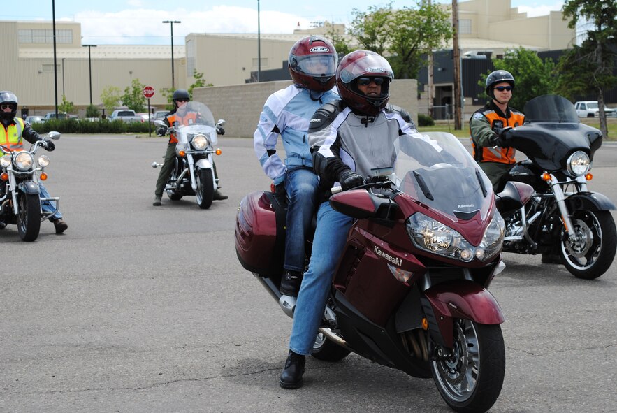 Brig. Gen. (Sel) Anthony Cotton and his wife, Marsha, prepare to lead the group of motorcyclists on a safety ride June 30.  The riders went 140 miles to Wolf Creek.  (U.S. Air Force photo/Airman 1st Class Katrina Heikkinen)