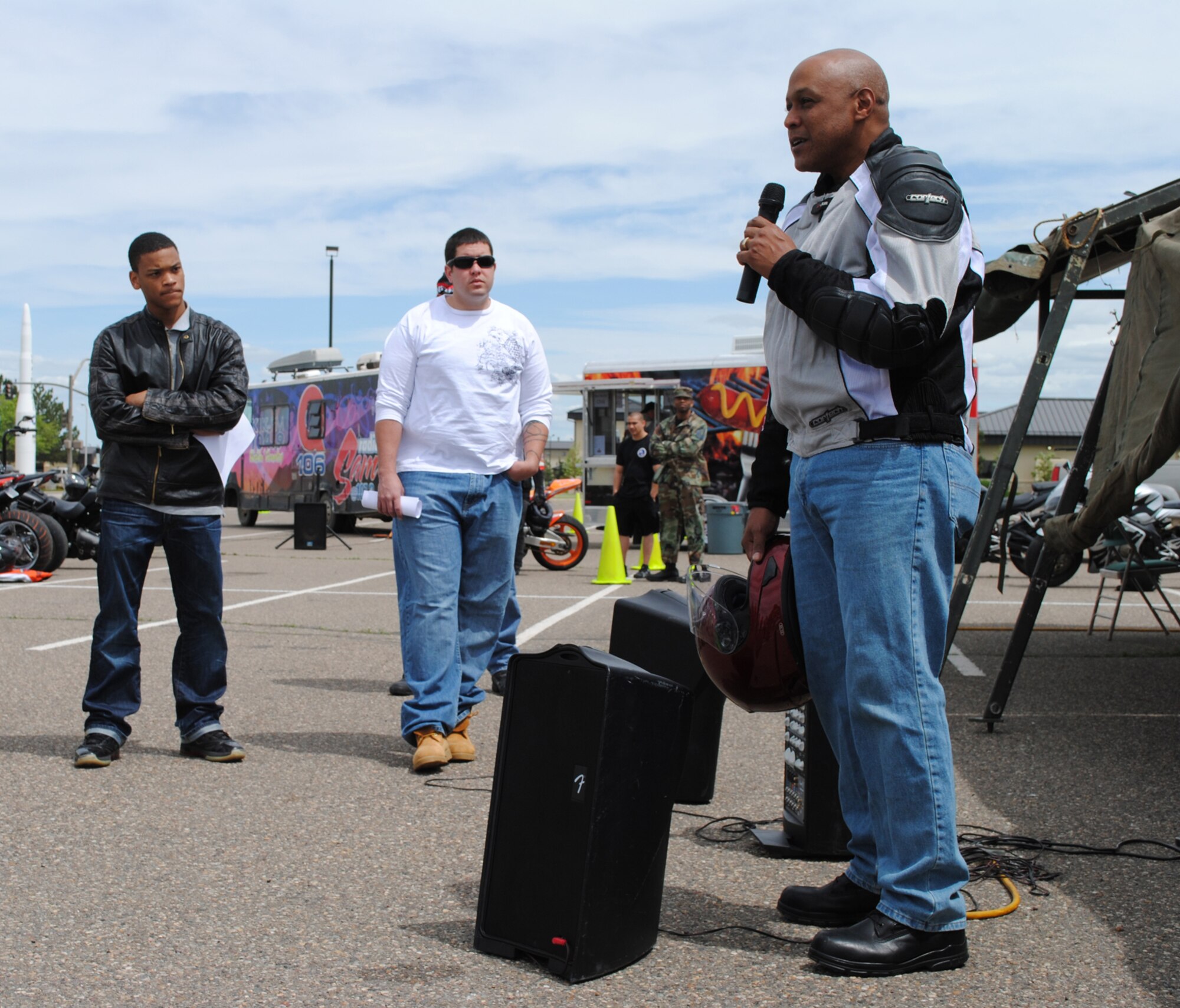 Brig. Gen. (Sel) Anthony Cotton, 341st Missile Wing commander, speaks to a crowd of bikers emphasizing the importance of motorcycle safety before leading a group of 25 riders on a 140-mile bike ride to Wolf Creek and Vaughn. (U.S. Air Force photo/Airman 1st Class Katrina Heikkinen)