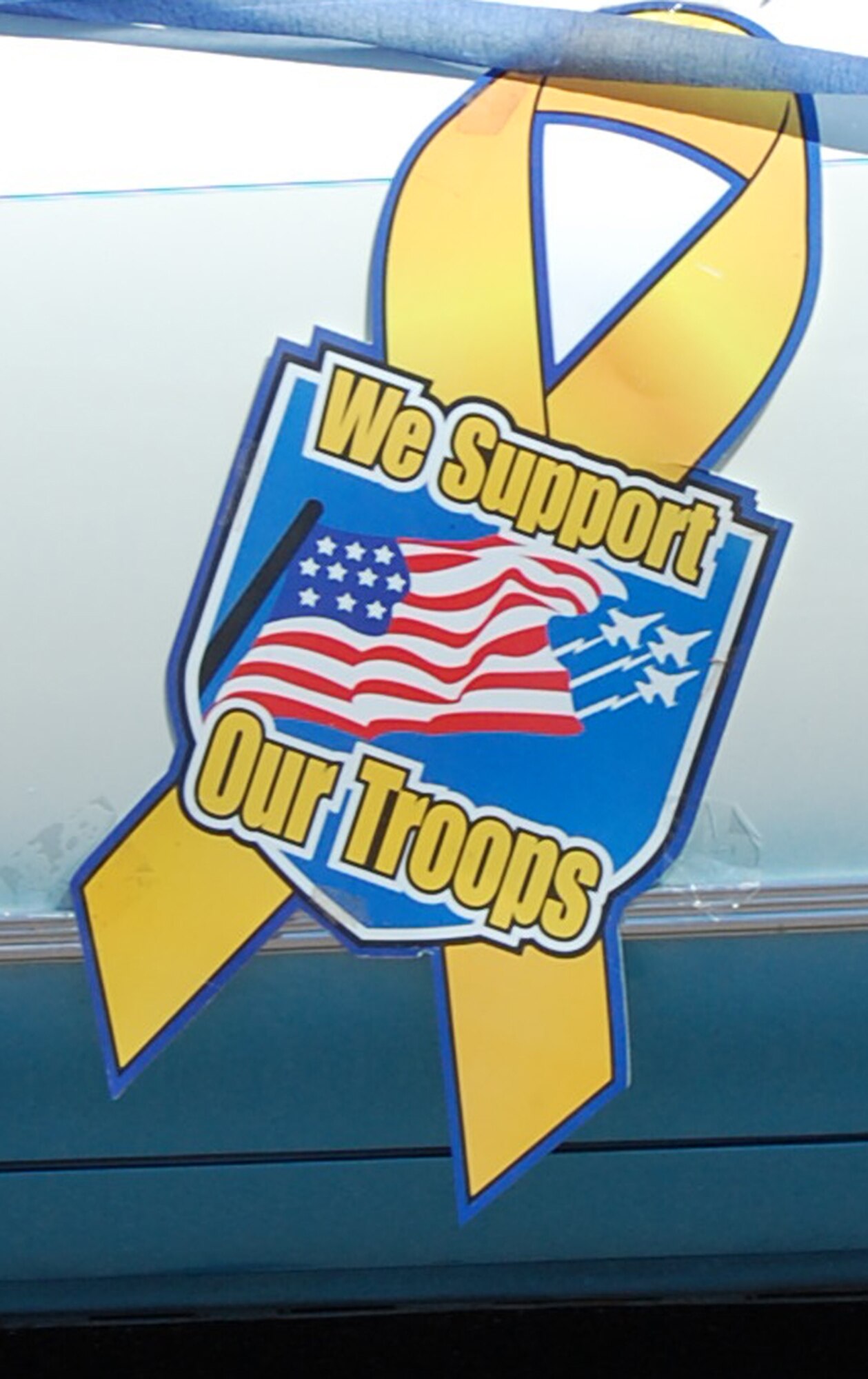 This magnetic sign was attached to one of the vehicles in the Fourth of July parade through downtown Great Falls Monday. (U.S. Air Force photo/Valerie Mullett)