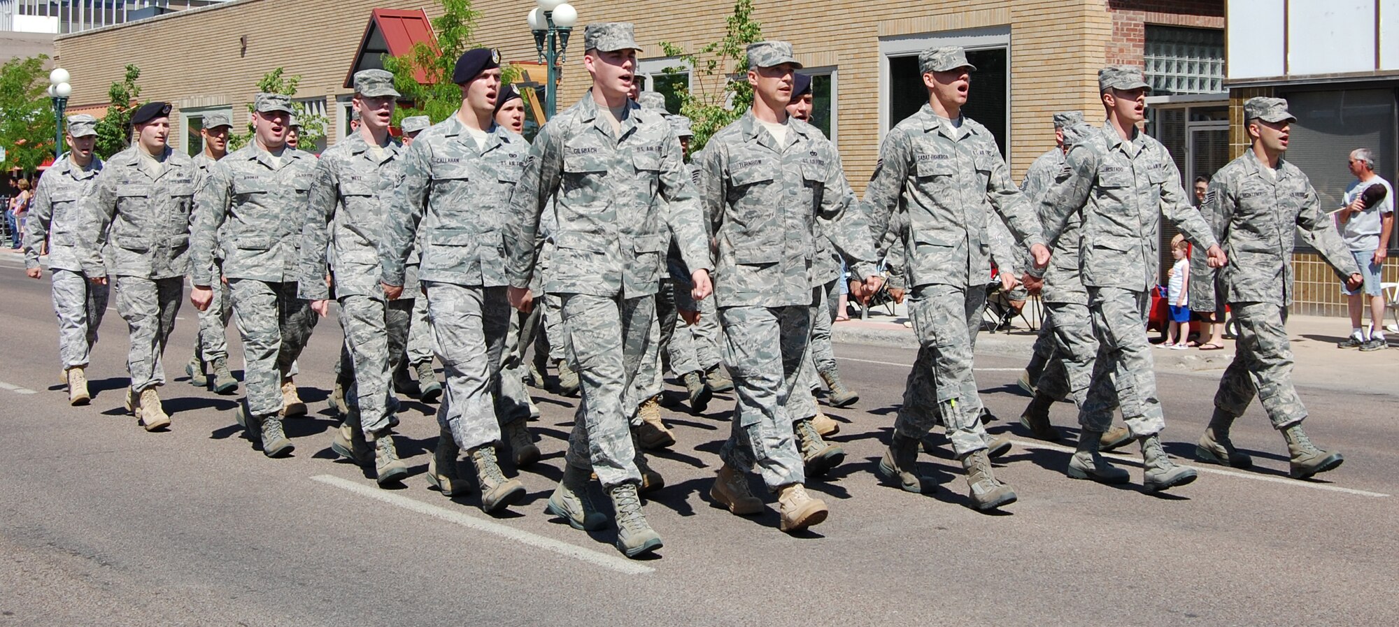Thirty members of Team Malmstrom for a marching unit to represent the 341st Missile Wing in the annual Fourth of July parade. They were led my Master Sgt. Robert Baker, 341st Operations Group first sergeant. (U.S. Air Force photo/Valerie Mullett)