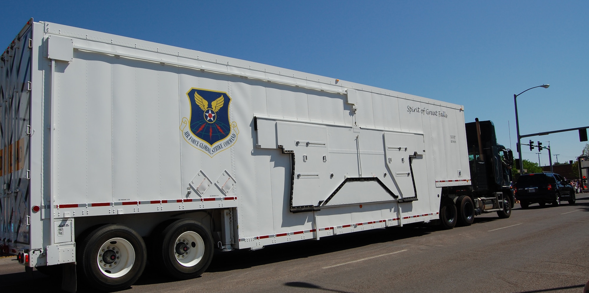 The largest vehicle participating in this year's parade was the newly painted "Spirit of Great Falls" Payload Transporter, or PT van. It was joined by several Security Forces, Explosive Ordnance Disposal, Fire Department and 819th RED HORSE eqiupment representing the 341st Missile Wing. The 120th Fighter Wing also had equipment in this year's parade. (U.S. Air Force photo/Valerie Mullett)