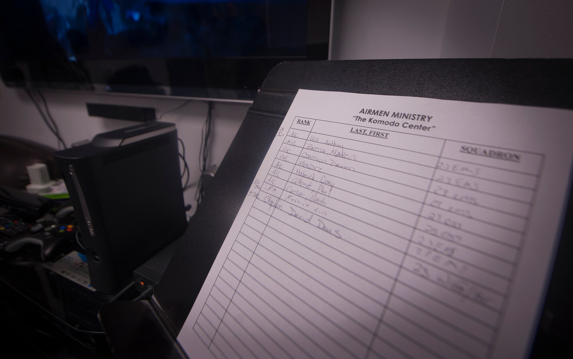 A check-in list sits on a stand at the Komodo Center at Moody Air Force Base, Ga., July 6, 2011. The Komodo Center is a location for Airmen to socialize and relax it has relocated from the 23rd Mission Support Group building to Bldg. 573 due to the current location’s scheduled demolition. (U.S. Air Force photo by Airman 1st Class Joshua Green/Released)

