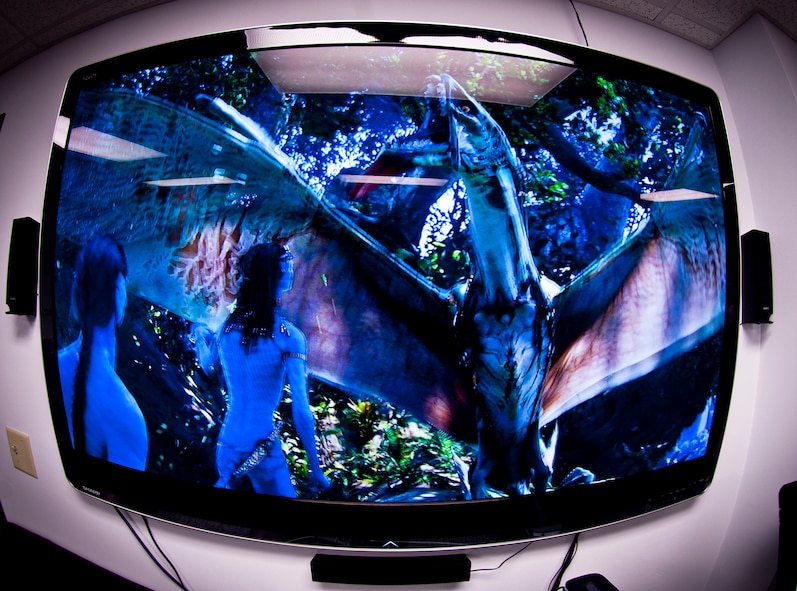 A scene from the movie Avatar is played on a 60-inch high-definition TV at the Komodo Center located in Bldg. 573 at Moody Air Force Base, Ga., July 6, 2011. Along with the TV, the Komodo Center has two Playstation 3 gaming consoles and an Xbox 360 for Airmen to use. (U.S. Air Force photo by Airman 1st Class Joshua Green/Released)

