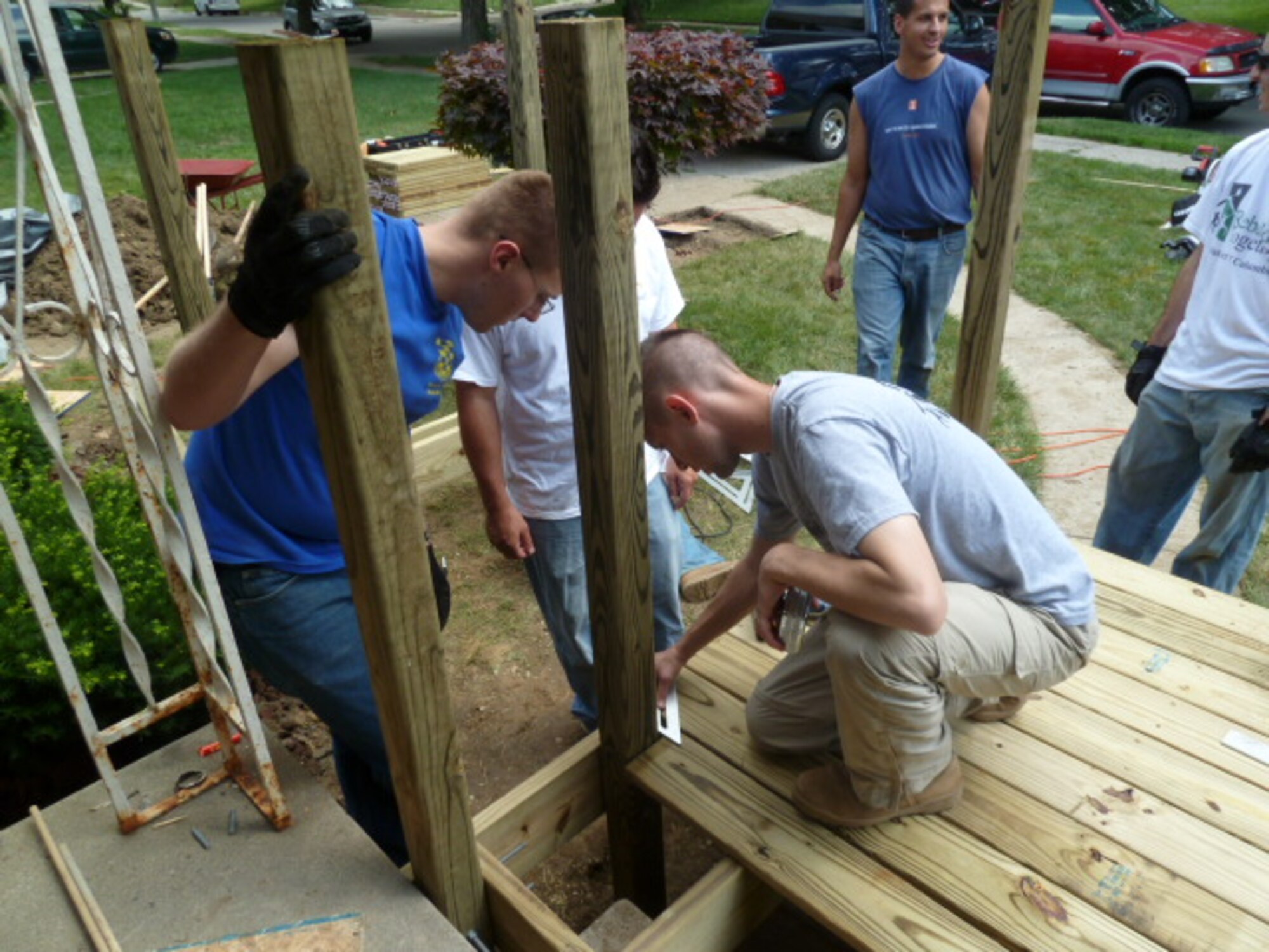 1st Lt. Alec Danaher and Capt. John Jaszkowiak square the decking boards.
