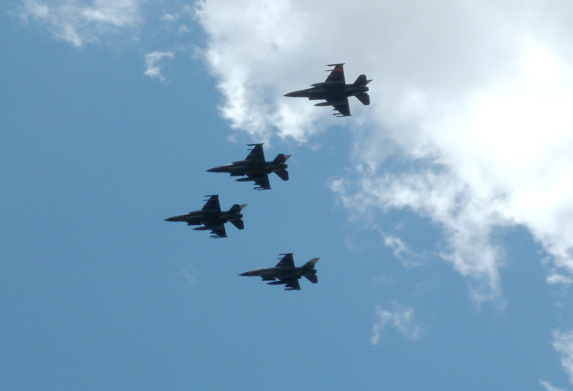 F-16s from the 162nd Fighter Wing flyby the 4th of July celebration at the Summerhaven community in Mt. Lemmon, Ariz. The pilots on board had a combined total of 14,834 F-16 flying hours. (Courtesy photo)