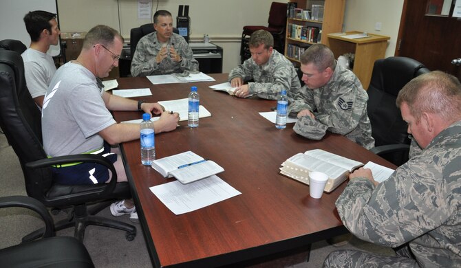 Members of the 386th Air Expeditionary Wing partake in a bible study July 7 at an undisclosed location in Southwest Asia. (U.S. Air Force photo by Senior Airman Rachelle Elsea)