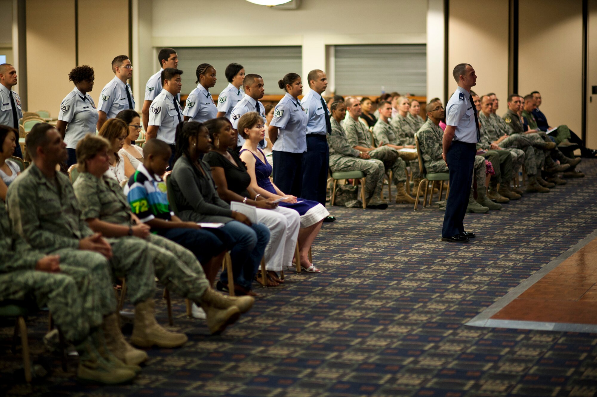 YOKOTA AIR BASE, Japan -- A formation of Airmen from the 374th Comptroller Squadron stand at parade rest during the 374th CPTS assumption of command ceremony at Yokota Air Base, Japan, July 7, 2011. (U.S. Air Force photo/Staff Sgt. Samuel Morse)