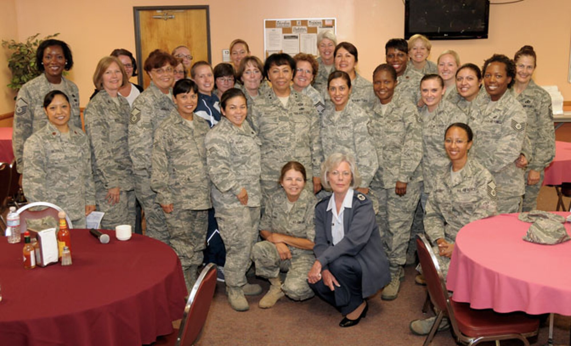 Major General Mary J. Kight, Assistant Adjutant General-Air, California National Guard poses with a group of female Airmen for a picture during her visit to the 146th Airlift Wing, Channel Islands Air National Guard Station, California, on July 09, 2011. MG Kight met with Airmen during two sessions to discuss her views on the value of leadership, mentoring programs and continuing education in the Guard.