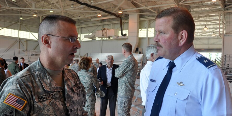 (Left to right) U.S. Army Col. Thomas Britttain, commander Joint Base Lewis-McChord, meets Fourth Air Force Commander Brig. Gen. Mark Kyle at McChord Field.  The commanders attended an Assumption of Command ceremony for Col. Bruce Bowers, 446th Airlift Wing here, July 9. (U.S. Air Force photo by Tech. Sgt. Elizabeth Moody)