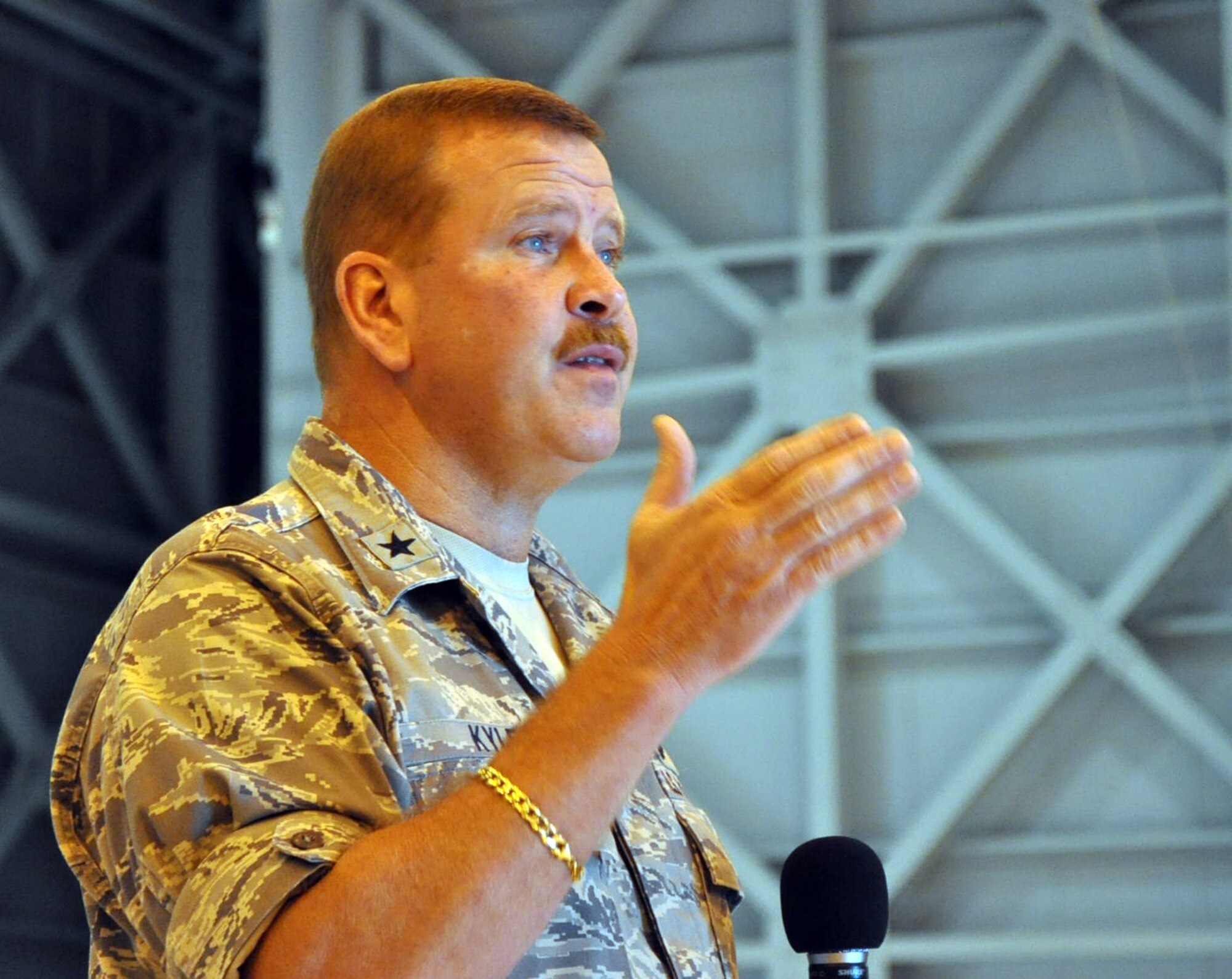 Fourth Air Force Commander Brig. Gen. Mark Kyle, addresses Reservists and active duty Airmen during an All Call at McChord Field, here July 9.  General Kyle talked about his priorities and answered questions from the audience.  "Citizen Airmen tied to the community have a lot of value," said the general.  (U.S. Air Force photo by Tech. Sgt. Elizabeth Moody)