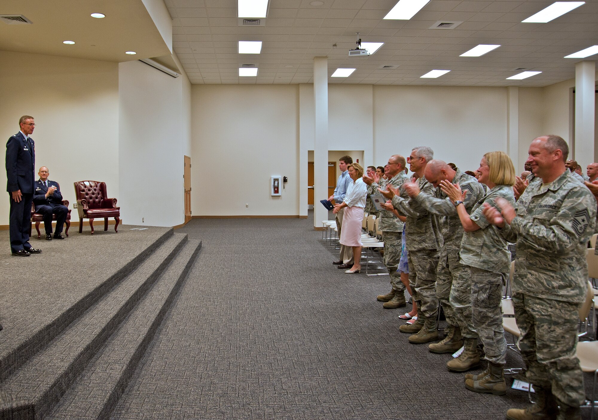 Lt. Col. Riley stands before the crowd as they welcome him as the new
Mission Support Group commander.  Though this is the first group Riley has
commanded, he brings a wealth of mission support knowledge having served
more than six years as the 315th MSG deputy commander, Charleston Air Force
Base, S.C.  
