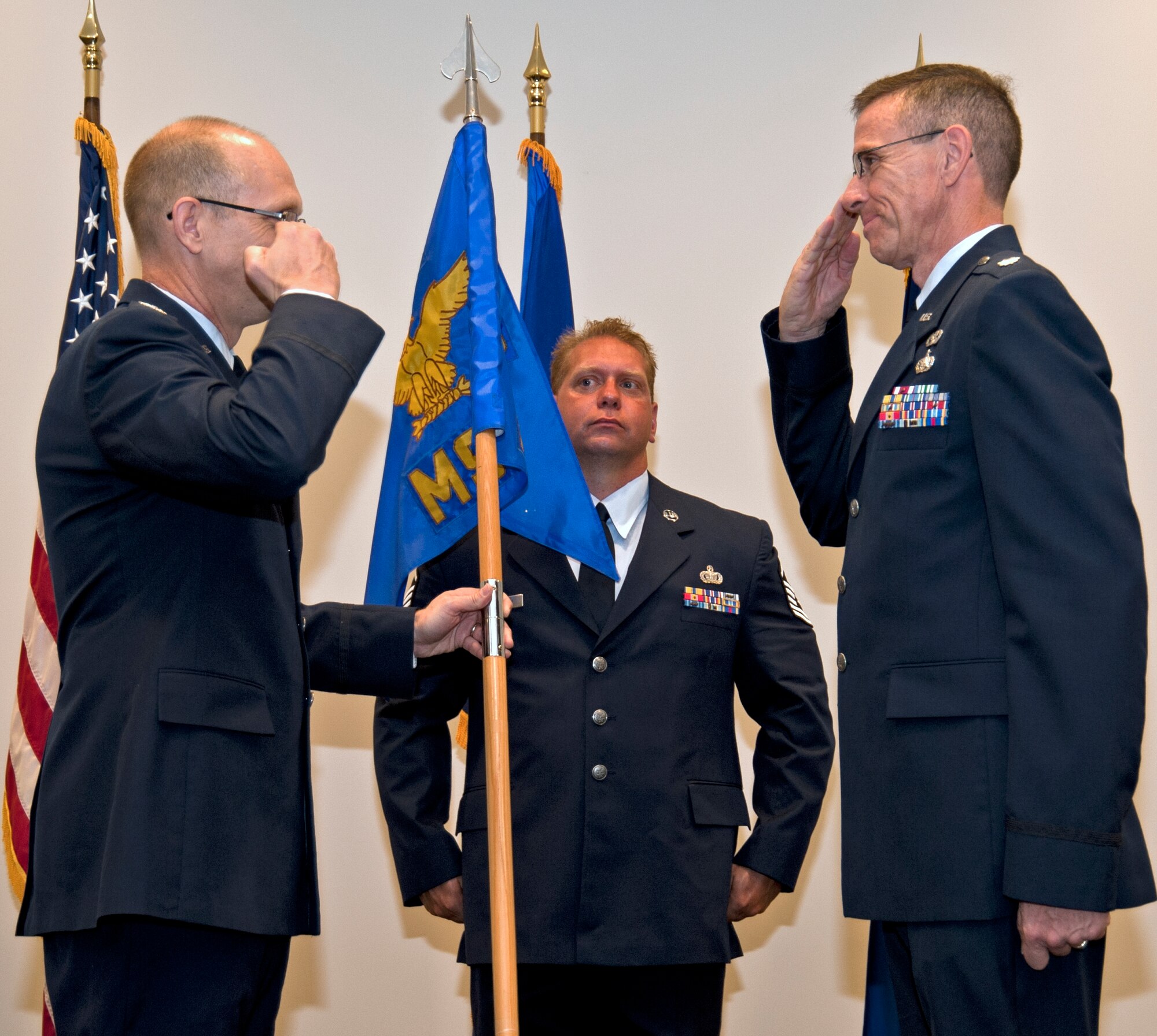 Lt. Col. Kevin Riley salutes Col. Jay Jensen, 403rd Wing commander,
before taking the 403rd Mission Support Group guidon in an Assumption of
Command ceremony held at the Roberts Maintenance Facility here during the
July Unit Training Assembly.  Though this is the first group Riley has
commanded, he brings a wealth of mission support knowledge having served
more than six years as the 315th MSG deputy commander, Charleston Air Force
Base, S.C.  
