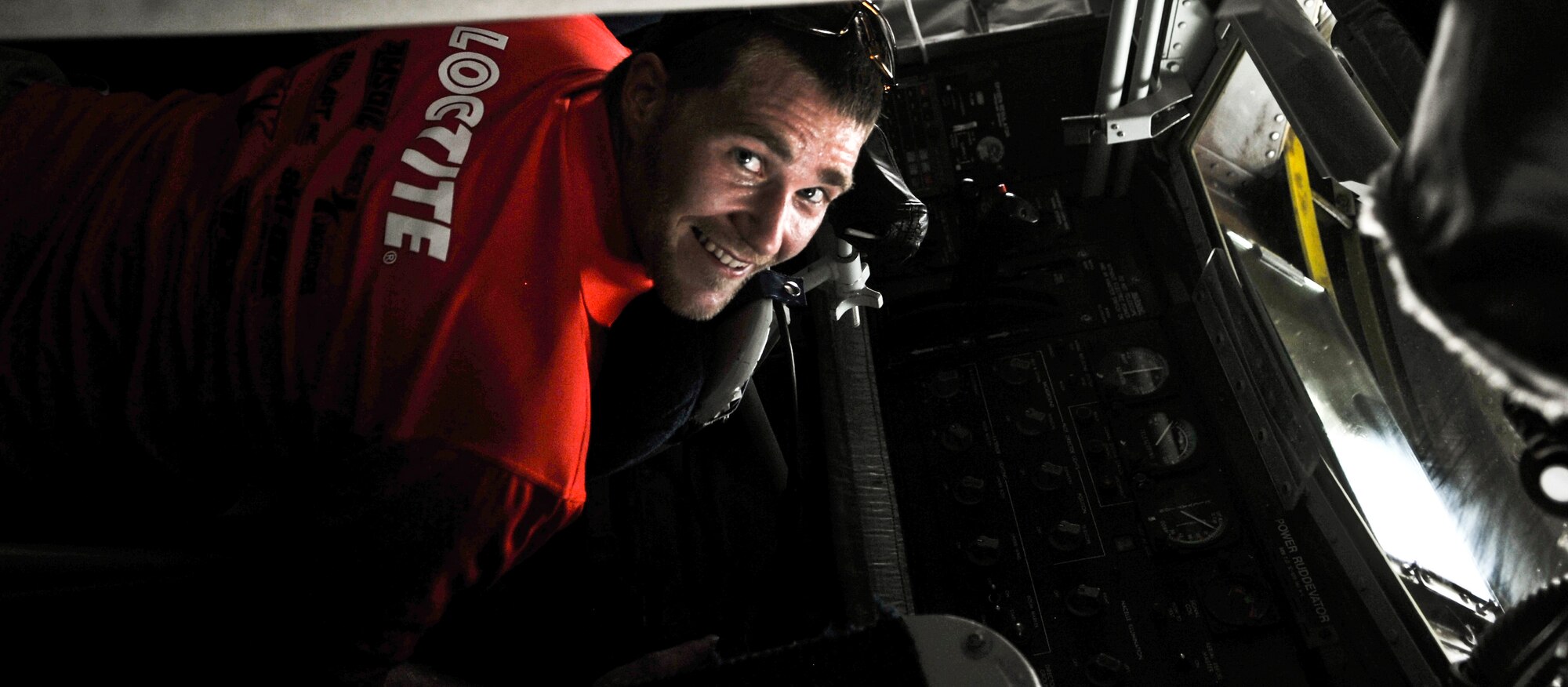 Mike Schultz, three-time ESPN X Games gold medal winner, sits at an aircraft refueling control, July 10, at an undisclosed location in Southwest Asia. Schultz, a three-time ESPN X Games gold medal winner in adaptive SnoX and MotoX, is considered the world's greatest above-knee amputee extreme sports athlete. (U.S. Air Force photo/Senior Airman Paul Labbe)