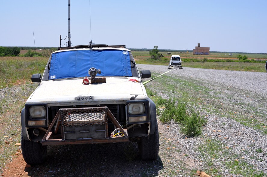 A hand-made remote control Jeep pulls a "moving target vehicle" for 457th pilots on Falcon Range, a bomb training facility owned by the 301st Fighter Wing. Falcon Range is one of only two unit-owned facilites of it’s kind in the Air Force Reserve. (U.S. Air Force photo/Staff Sgt. Chris Bolen)