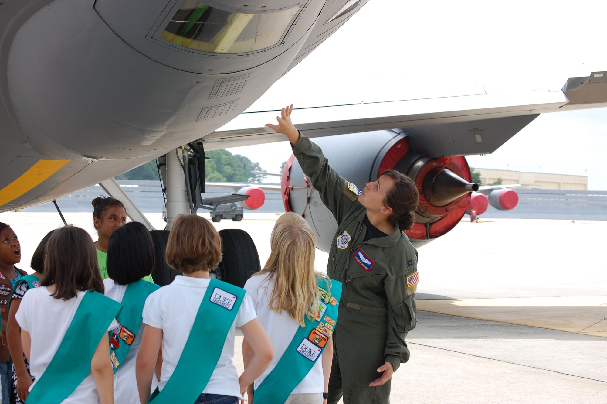 Capt. Jessica Guarini, 911th Air Refueling Squadron pilot, talks to Girl Scouts from local troops about the KC-135R Stratotanker during a tour here on July 9. (USAF photo by Donna Lea, 916ARW/PA)