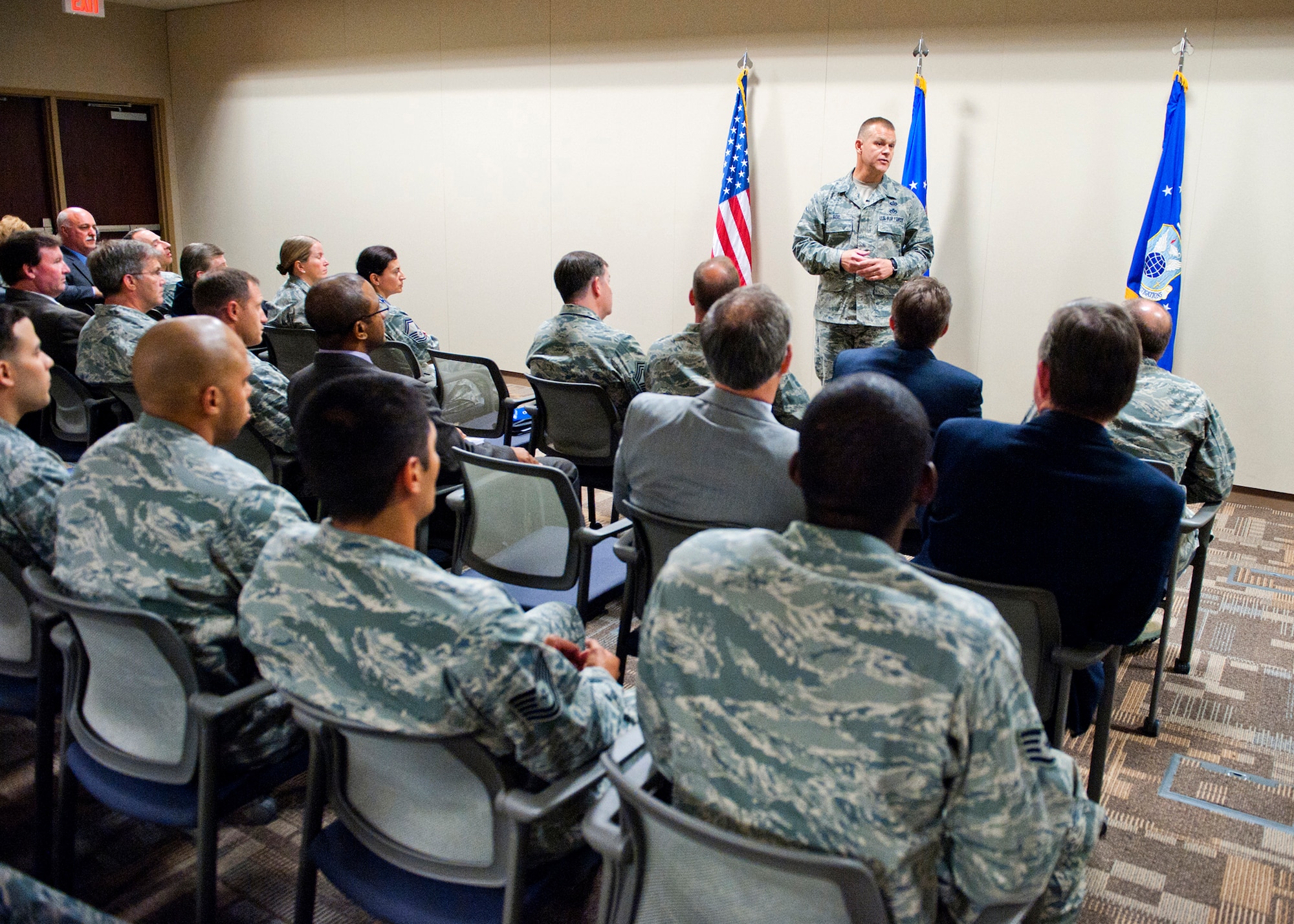 Chief Master Sergeant of the Air Force James A. Roy speaks to AFOSI civilians and military members during an "all-call" at the OSI headquarters. Chief Roy talked with the group about the growing importance of joint coalition operations in the Middle East; stressed the necessity of education, experience and training for proper development of both the enlisted and officer force; and finally encouraged strength and resiliency, especially in these difficult times. (U.S. Air Force Photo by Mr. Mike Hastings)