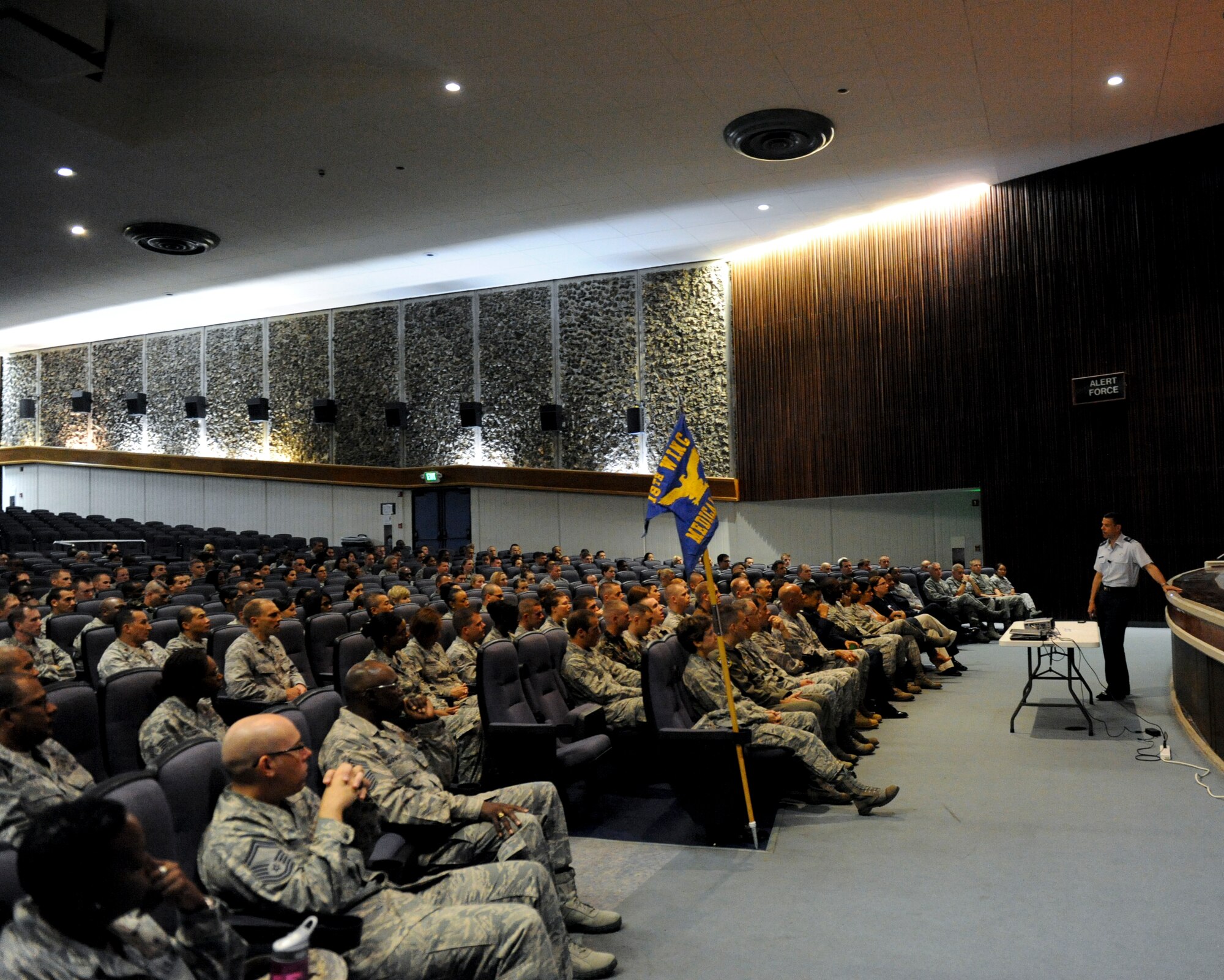 Brig. Gen. Matt Molloy, 18th Wing commander, talks to Airmen from both the 18th Wing Staff Agencies and the 18th Medical Group during a commander’s call July 8. Molloy discussed what he expected of the Airmen and what he hopes to accomplish during his tour here at Kadena Air Base. (U.S. Air Force photo/ Airman 1st Class Brooke P. Beers)