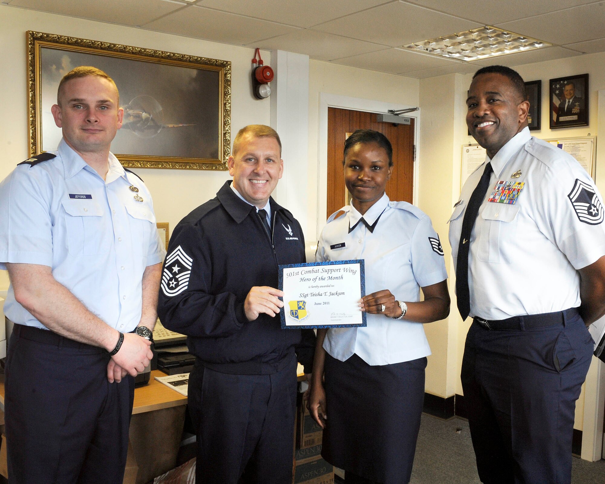 RAF MENWITH HILL, United Kingdom - Staff Sgt. Teisha Jackson, 421st Air Base Squadron, is recognized July 11 as a 501st Combat Support Wing Everyday Hero. For the last eight months Jackson has singlehandedly managed her duties and the duties of a master sergeant position with no degradation in performance. As the NCOIC of the commander's support staff she supports nearly 700 military and civilian personnel.