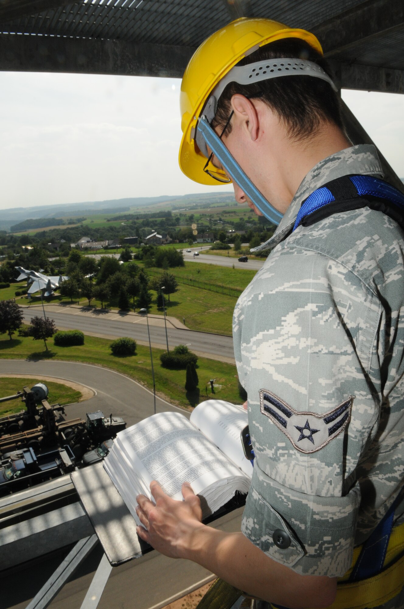 SPANGDAHLEM AIR BASE, Germany – Airman 1st Class Mark Detwiler, 52nd Communications Squadron ground radar systems apprentice, reads an instruction checklist prior to performing preventative maintenance on a radar system here July 5. The 52nd CS’s ground radar systems Airmen are on the job all hours of the day to maintain and control the two radar systems that send information to the air-traffic control tower. (U.S. Air Force photo/Senior Airman Nick Wilson)