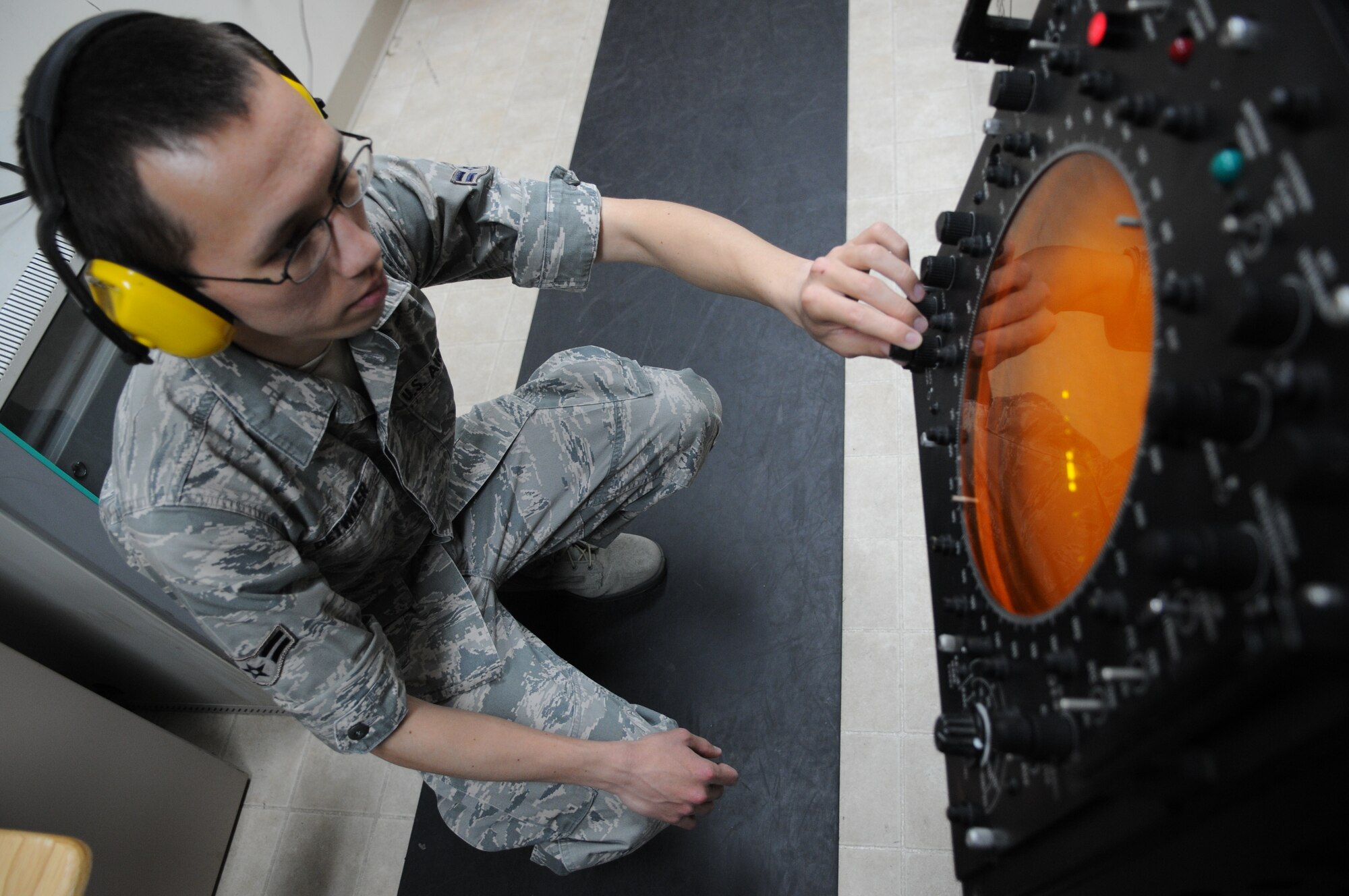 SPANGDAHLEM AIR BASE, Germany – Airman 1st Class Mark Detwiler, 52nd Communications Squadron ground radar systems apprentice, checks processor video levels to ensure they are sufficient enough to send to the base’s air-traffic control tower here July 5. The 52nd CS’s ground radar systems Airmen are on the job all hours of the day to maintain and control the two radar systems that send information to the air-traffic control tower. (U.S. Air Force photo/Senior Airman Nick Wilson)