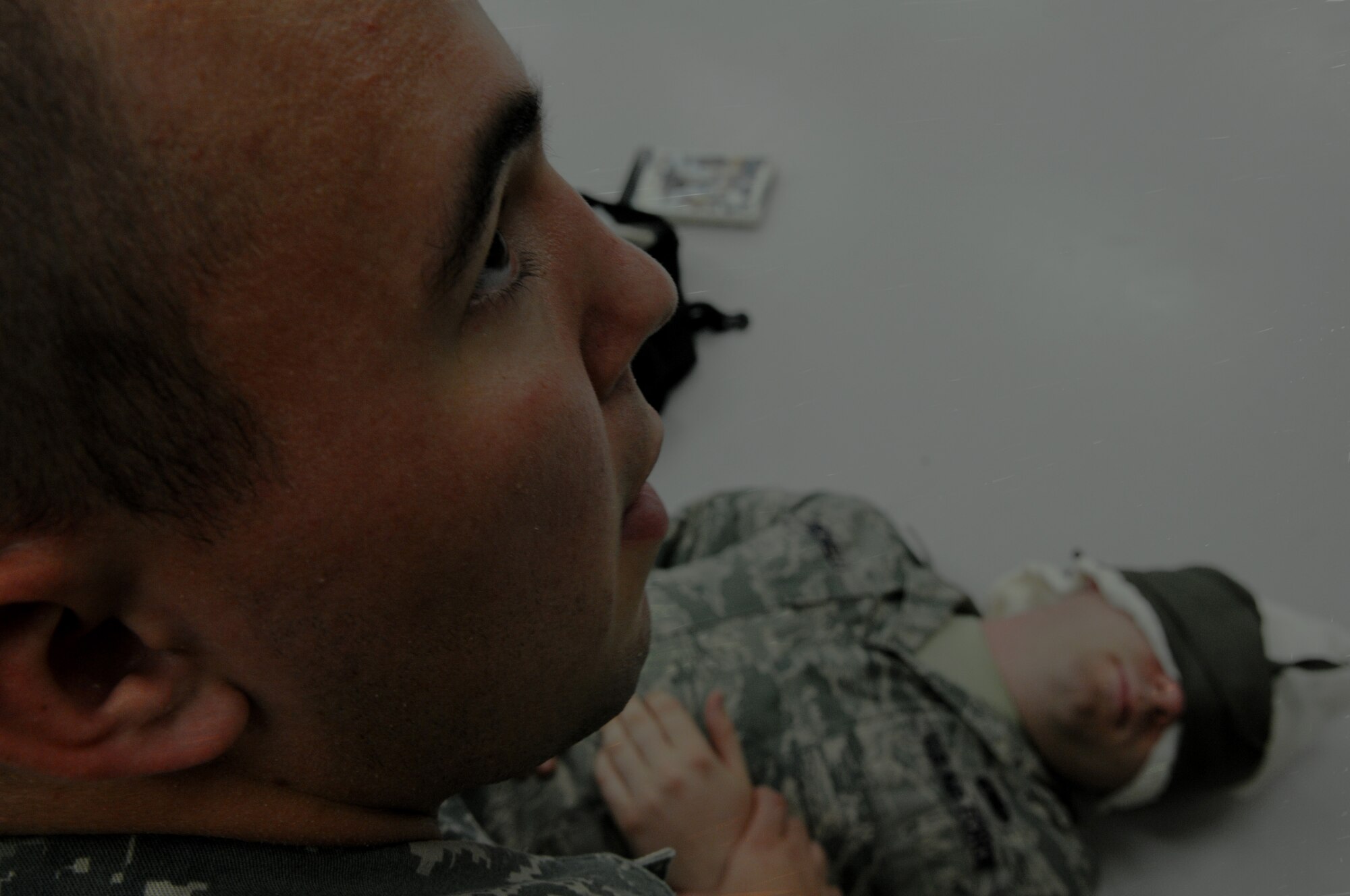 Airman 1st Class Richard Bower, 18th Component Maintenance Squadron precision measurement equipment laboratory apprentice, checks the pulse of a simulated victim who had an injury to his eyes during a Local Operational Readiness Exercise July 11 at Kadena Air Base, Japan. Beverly High 11-05, the July LORE, is one way the Airmen train for real-world scenarios they might be presented with.  (U.S. Air Force photo/Airman 1st Class Jarvie Z. Wallace)
