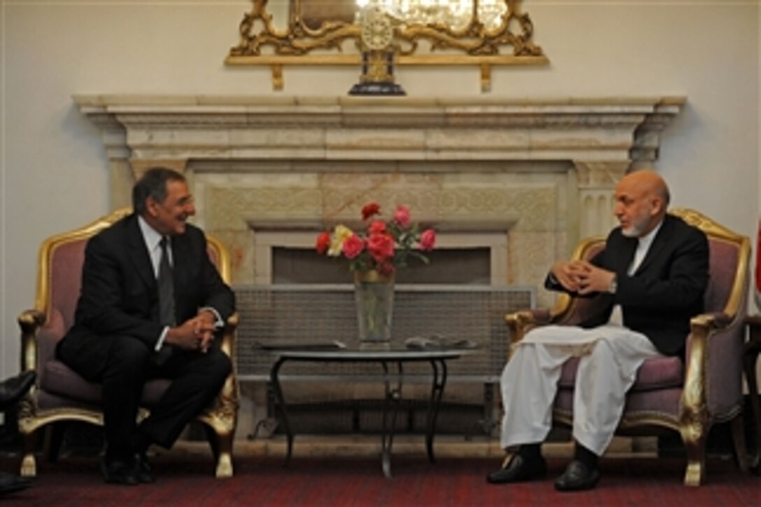 Secretary of Defense Leon E. Panetta meets with Afghanistan President Hamid Karzai at the presidential palace in Kabul, Afghanistan, on July 9, 2011.  