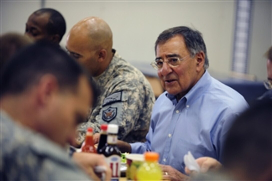 Secretary of Defense Leon E. Panetta has lunch with troops at Camp Victory, Iraq, on July 11, 2011.  