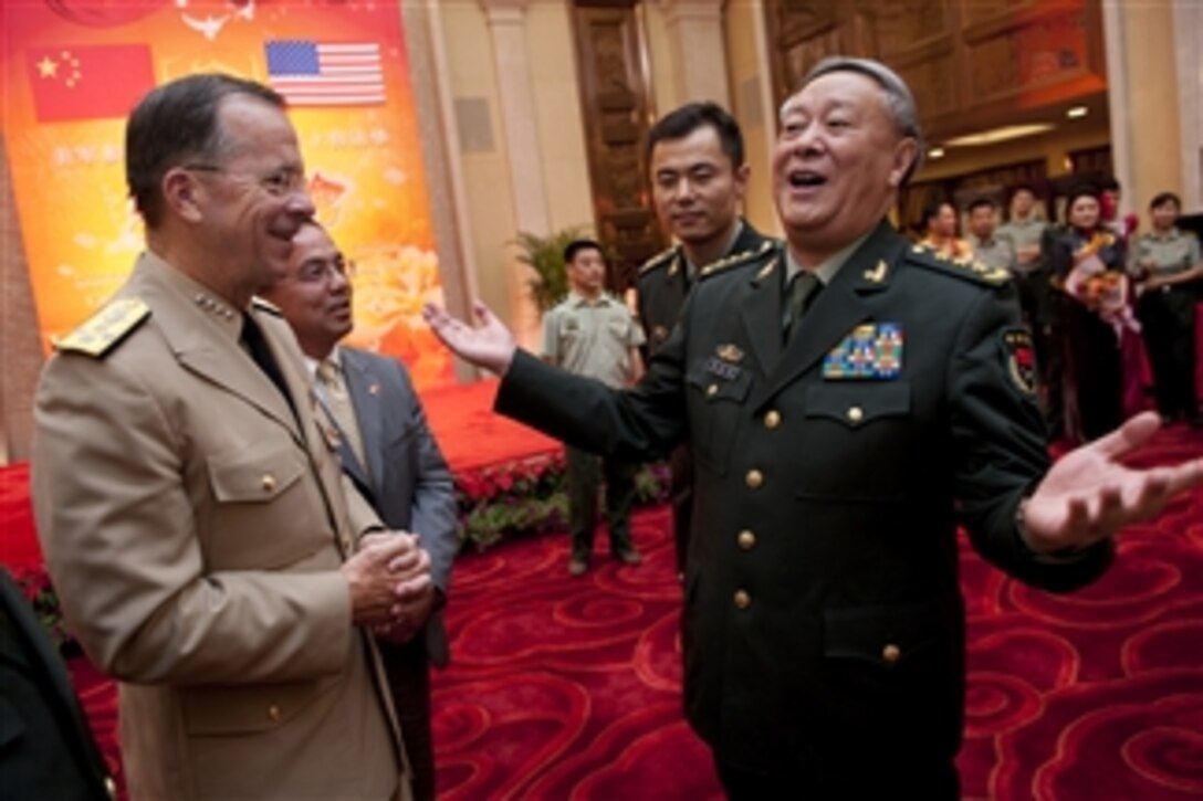 Chairman of the Joint Chiefs of Staff Adm. Mike Mullen shares a laugh with Chief of the Peoples Liberation Army's General Staff Gen. Chen Bingde in Beijing, China, on July 11, 2011.  Mullen is on a three-day trip to the country meeting with counterparts and Chinese leaders.  