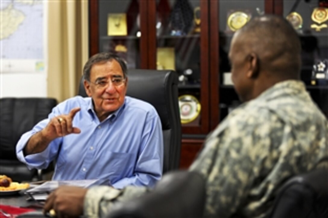 U.S. Defense Secretary Leon E. Panetta meets with U.S. Army Gen. Lloyd J. Austin III, commander of U.S. Forces Iraq, at Camp Victory, Iraq, July 11, 2011.