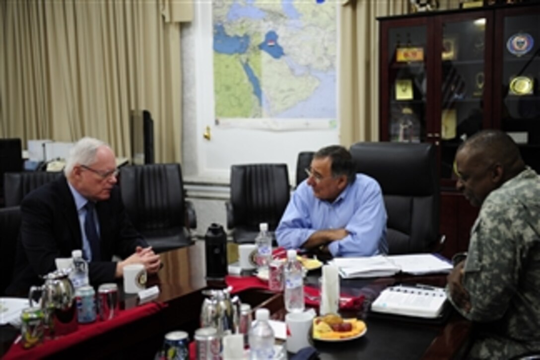 Secretary of Defense Leon E. meets with U.S. Ambassador to Iraq James Jeffrey and Commander of United States Forces-Iraq Gen. Lloyd J. Austin III at Camp Victory, Iraq, on July 11, 2011.  