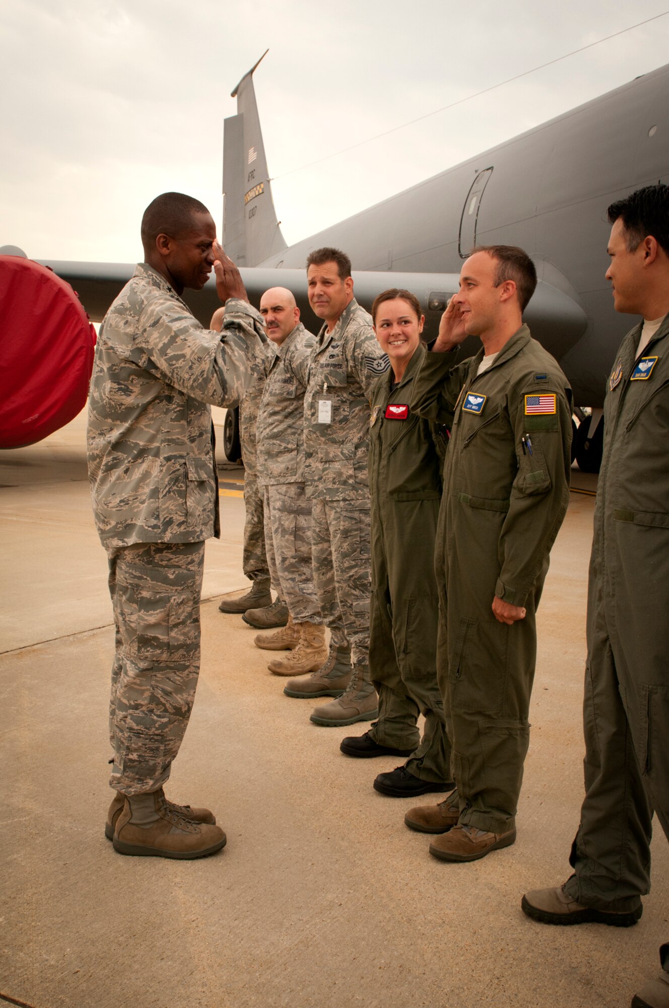 JOINT BASE ANDREWS, Md. -- Maj. Gen. Darren W. McDew, Air Force District of Washington commander, thanks 459th Air Refueling Wing aircrew and maintenance specialists on the flightline here July 6, 2011. The Reserve Airmen were being recognized for supporting a KC-135 Stratotanker airlift of inspectors for a recent Unit Compliance Inspection performed on the host active-duty Air Force wings here in June. (U.S. Air Force photo/Tech. Sgt. Steve Lewis).