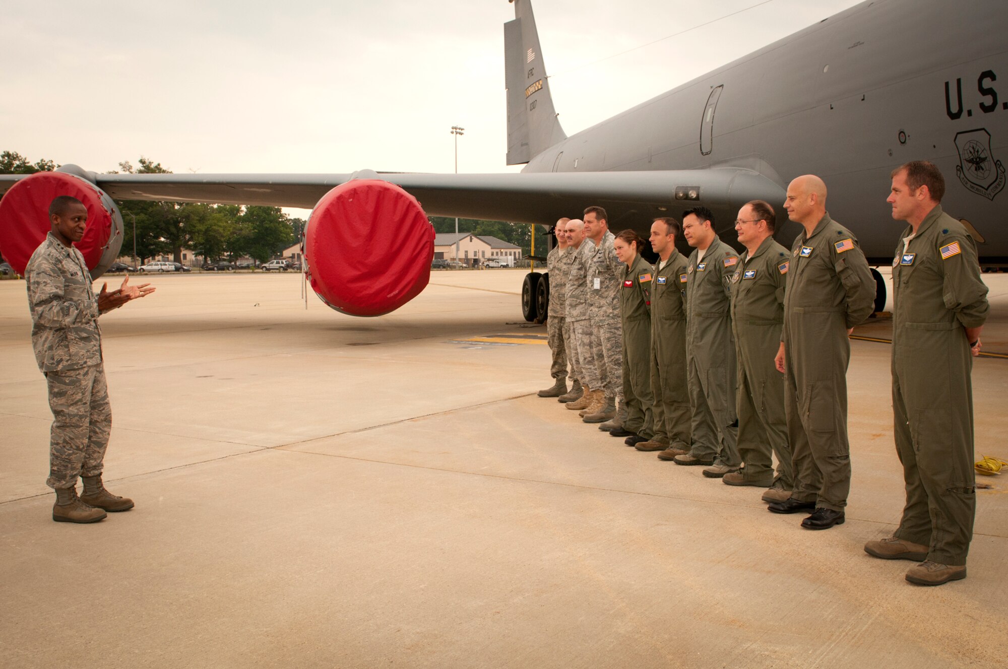 JOINT BASE ANDREWS, Md. -- Maj. Gen. Darren W. McDew, Air Force District of Washington commander, thanks 459th Air Refueling Wing aircrew and maintenance specialists on the flightline here July 6, 2011. The Reserve Airmen were being recognized for supporting a KC-135 Stratotanker airlift of inspectors for a recent Unit Compliance Inspection performed on the host active-duty Air Force wings here in June. (U.S. Air Force photo/Tech. Sgt. Steve Lewis).