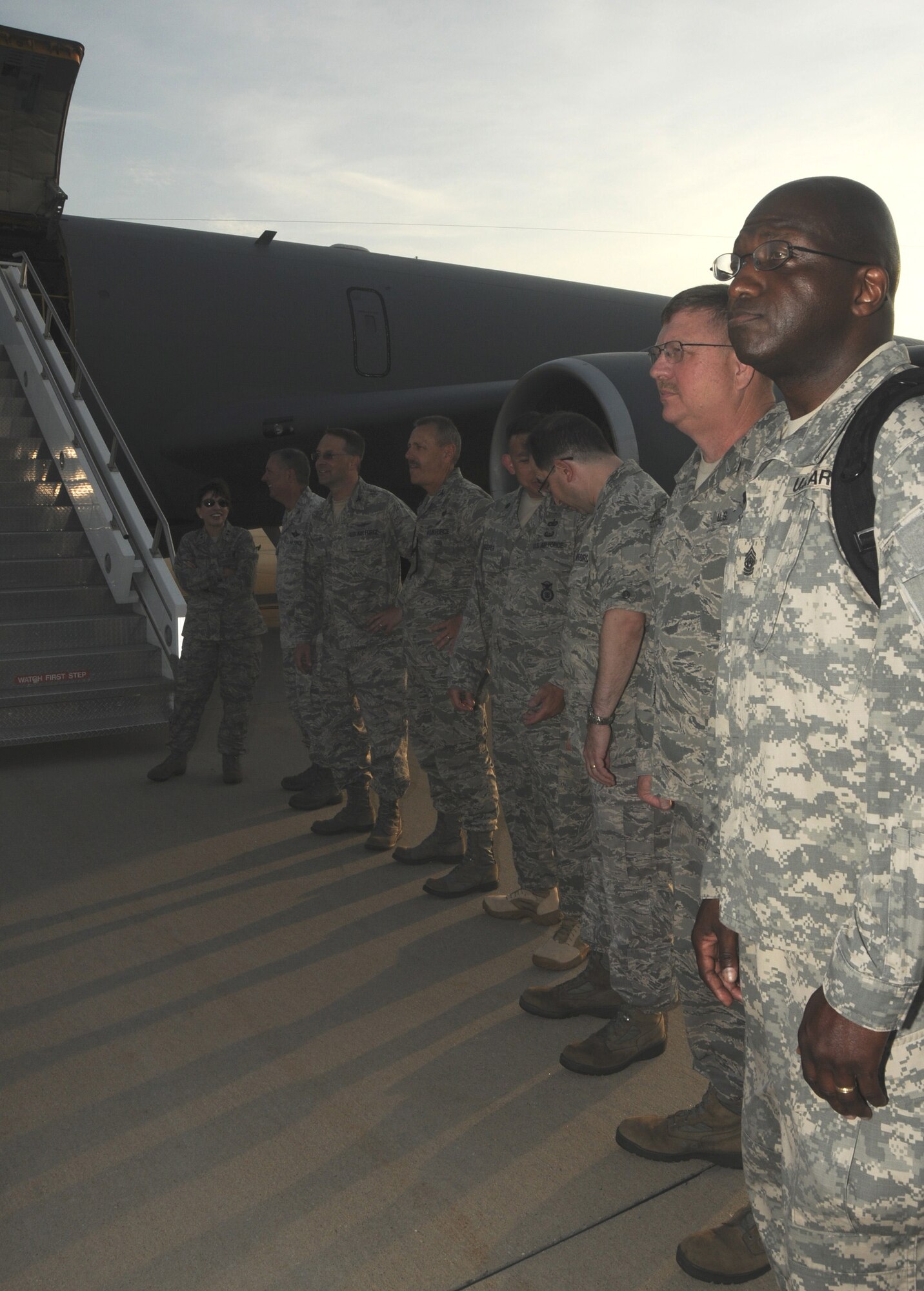 Senior leadership from the 108th Wing and New Jersey Air National Guard line up in front of a KC-135R Stratotanker to say farewell to the approximately 30 members of the 108th Security Forces Squadron deploying from Joint Base McGuire-Dix-Lakehurst on July 12, 2011. The security forces members deployed to Southwest Asia in support of Operation New Dawn where they will be responsible for maintaining security at the air base. (U.S. Air Force photo/Airman Kellyann Novak)