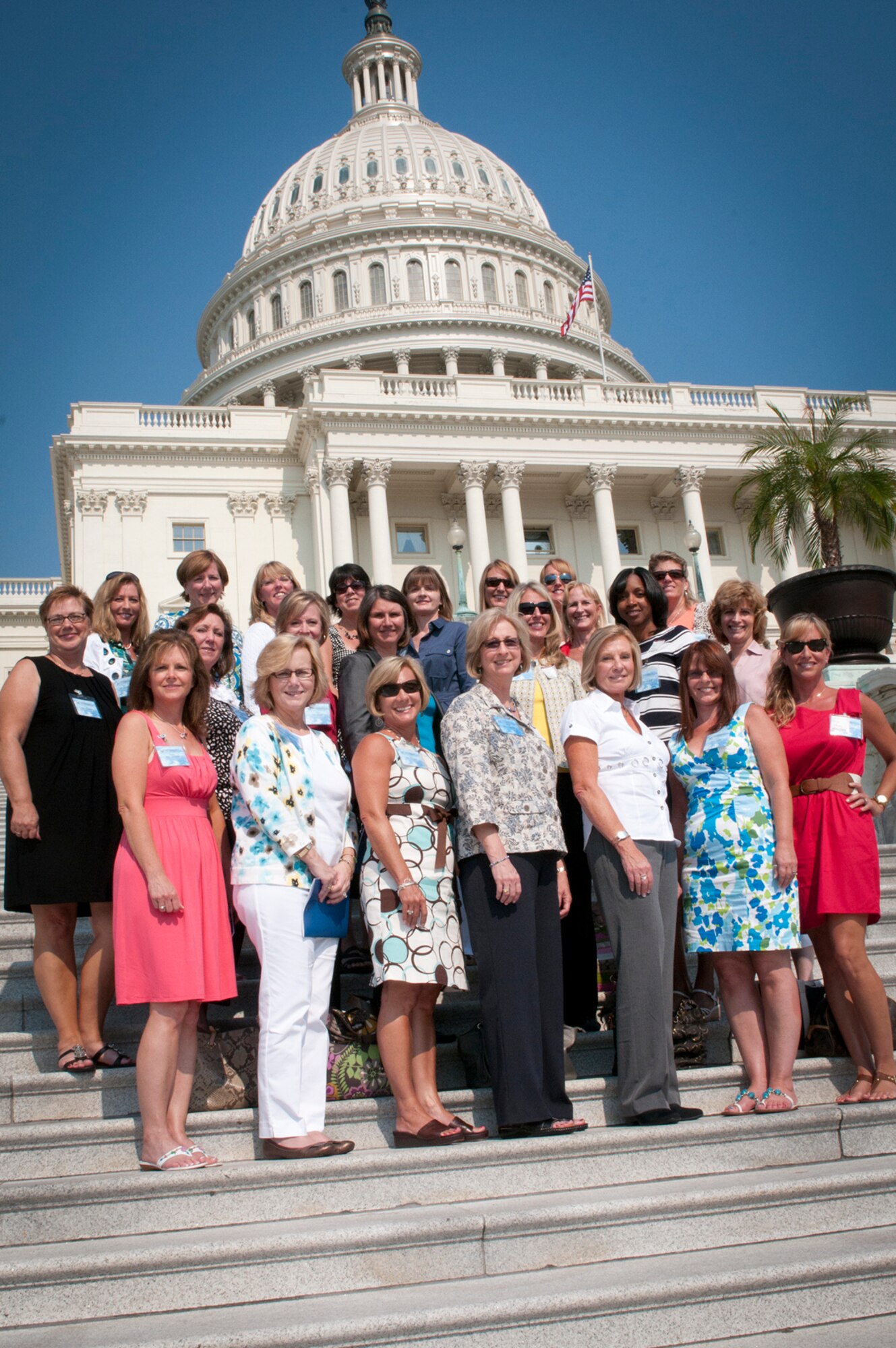 WASHINGTON -- Spouses of Air Force Reserve Command commanders pose for a photo on the steps of the U.S. Capitol after taking part in a tour of the building here, meeting with a member of Congress and receiving a briefing on military programs here July 8, 2011. The Capitol Hill visit was part of this year's Air Force Reserve Commander and Spouse Forum, held July 6-9. The forum provided an opportunity for the wing leaders and their wives to engage in discussions with different organizations about military issues and gain information on new programs. (U.S. Air Force photo/Tech. Sgt. Steve Lewis)
