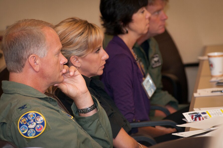 WASHINGTON -- Commanders and their spouses listen to a briefing given by Lt.. Gen. Charles E. Stenner Jr., Air Force Reserve Command commander, during a forum here July 9, 2011. This year's Air Force Reserve Commander and Spouse Forum, held July 6-9, provided an opportunity for the wing leaders and their wives to engage in discussions with different organizations about military issues and gain information on new programs. (U.S. Air Force photo/Tech. Sgt. Steve Lewis)