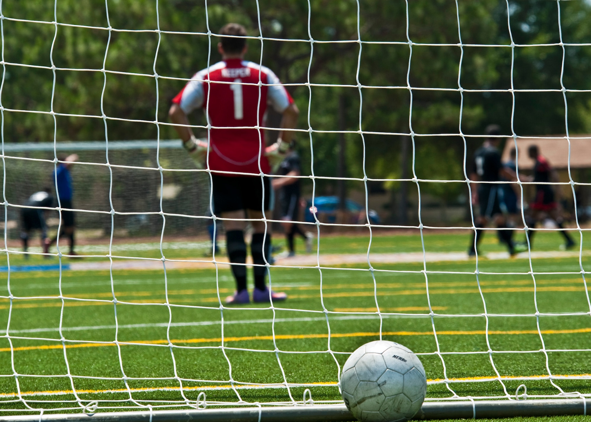 Sean Gresham protects Eglin's goal at the military soccer tournament at Hurlburt Field July 9. Eglin's team defeated Patrick Air Force Base and Pensacola Naval Air Station. The games were a warm-up for the 2011 Defender’s Cup in San Antonio during Labor Day weekend. Eglin is the defending champion of the tournament.  (U.S. Air Force photo/Sachel Seabrook) 
