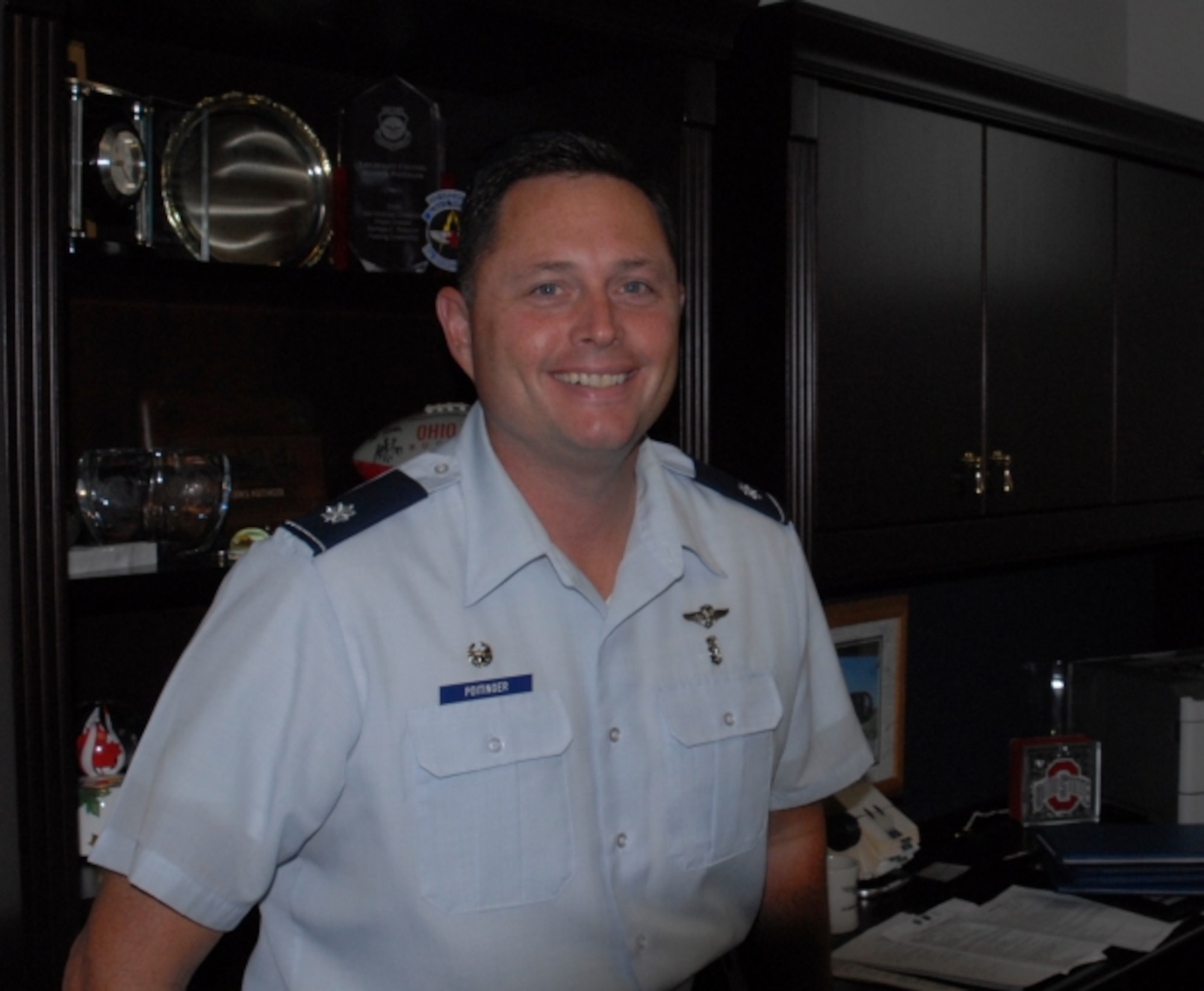 Lieutenant Col. Kevin Poitinger, 325th Medical Operations Squadron commander, in his office after recently taking command of the squadron. (U.S. Air Force photo by 2nd Lt. Melanie Holliday)
