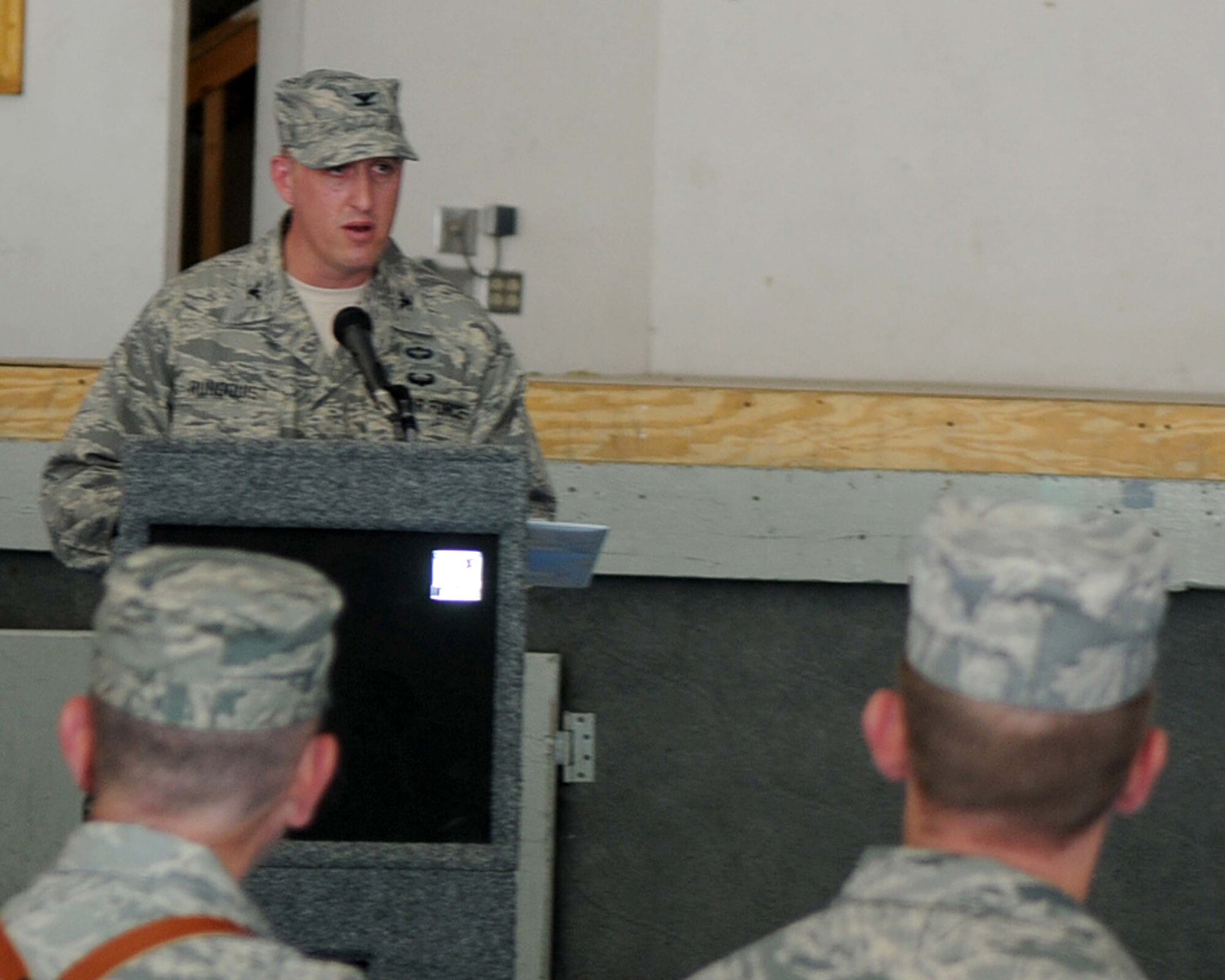 BAGRAM AIRFIELD, Afghanistan -- Col. Erik Rinquist, 455th Expeditionary Mission Support Group commander, gives his assumption of command speech during the official change of command ceremony here July 11, 2011. During the ceremony, Col. Jeffrey Hunt relinquished command to Colonel Rinquist. 