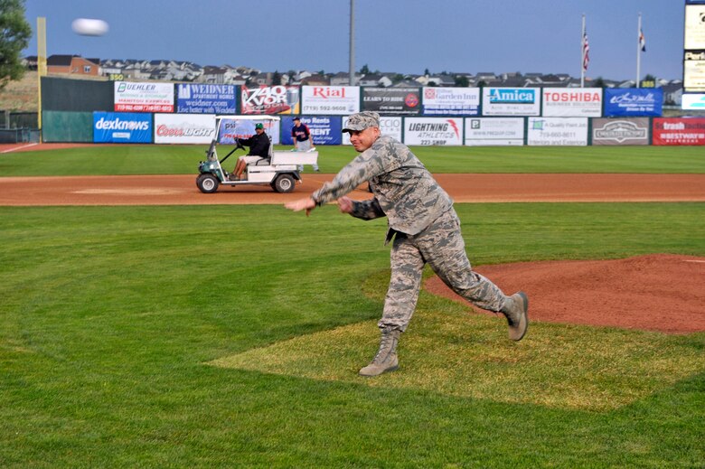 COLORADO SPRINGS, Colo. –Col. Chris Crawford, 21st Space Wing commander, throws out the first pitch at a Sky Sox game July 6, 2011. Crawford and leadership from other Front Range bases threw out the ceremonial first pitches in honor of military appreciation night at the stadium. (U.S. Air Force photo/Robb Lingley)