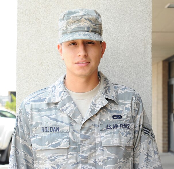 I run every day. I never had many problems with push-ups and sit ups. - Senior Airman John Roldan, 436th Maintenance Squadron. (U.S. Air Force photo by Senior Airman Matthew Hubby)