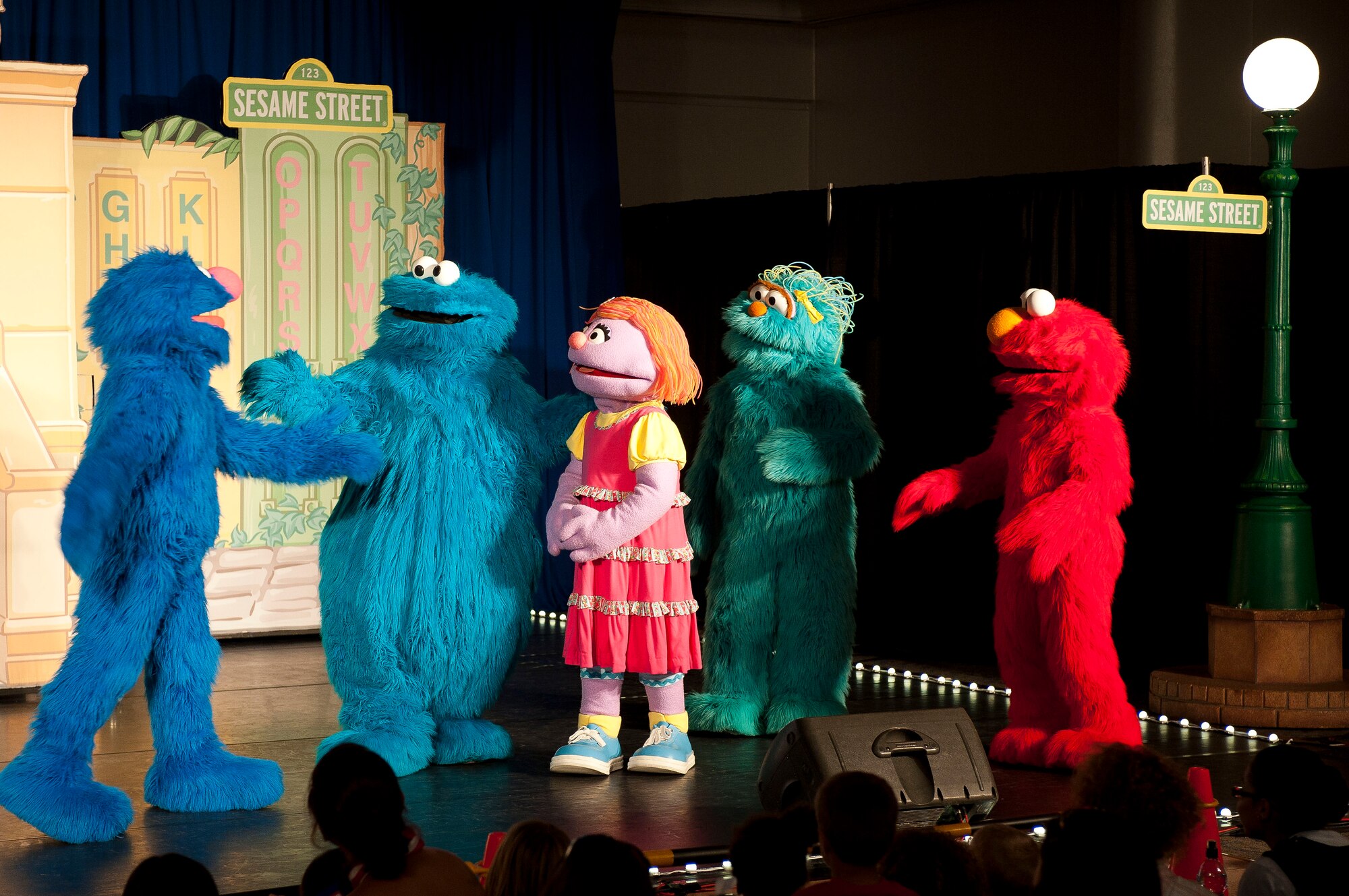 The Sesame Street crew offers Katie, a child in a military family, advice on how to stay in touch with old friends and how to make new friends after moving to a new base during the Sesame Street/USO Experience Experience July 11, 2011, at the Club Complex Ballroom at Incirlik Air Base, Turkey. The performance was part of a tour to U.S. military bases worldwide geared specifically toward helping children of military members deal with the stresses of deployment. (U.S. Air Force photo by Airman 1st Class Clayton Lenhardt/Released)