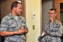 KUNSAN AIR BASE, Republic of Korea -- Maj. Gen. Timothy Byers, Air Force Civil Engineer, Headquarters U.S. Air Force, talks with Lt. Col. Christopher Leonard, 8th Civil Engineer Squadron commander, about dormitory renovations here July 10. Byers is responsible for installation support functions at 166 Air Force bases worldwide with an annual budget of more than $12 billion. (U.S. Air Force photo/Senior Airman Brittany Y. Bateman) 

