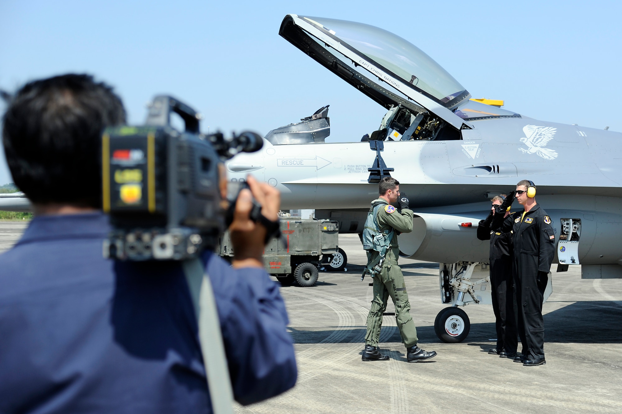 Brunei Darussalam -- The Pacific Air Forces Demonstration Team performs their final ground show for the local media during the 3rd Biennial Brunei Darussalam International Defense Exhibition at Rimba Air Base, Brunei, July 9. More than 11,000 people came to see aerial demonstrations and tour the different aircraft on display. (U.S. Air Force photo/Staff Sgt. Marie Brown/Released)