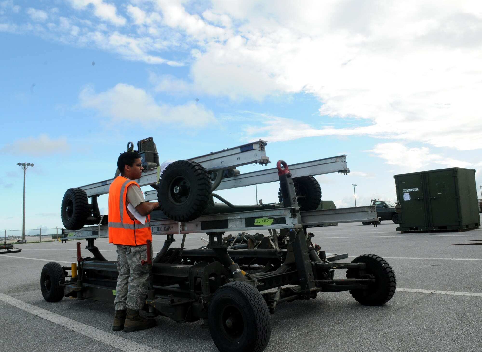 Airman 1st Class Paul Pacheco, 18th Logistics Readiness Squadron cargo receptionist, verifies the correct cargo movement for transportation July 12 during Beverly High 11-5, a Local Operational Readiness Exercise at Kadena Air Base, Japan. The 18th Wing is participating in the LORE July 11-13 to test the readiness of Kadena Airmen. (U.S. Air Force photo/Airman 1st Class Jarvie Z. Wallace)
