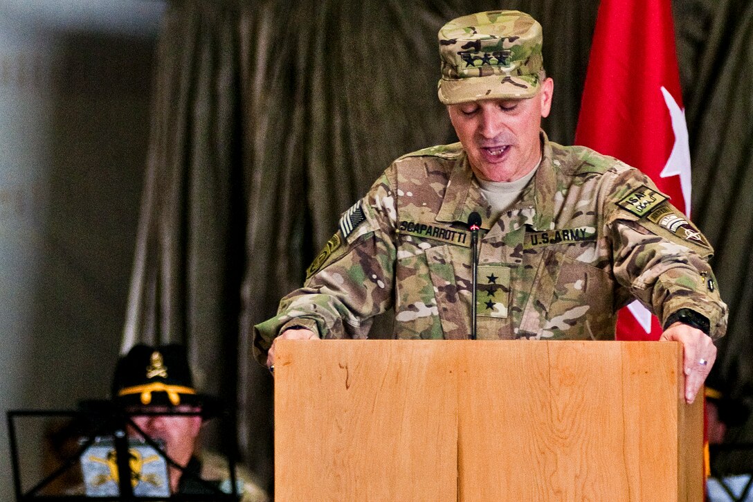 U.S. Army Lt. Gen. Curtis Scaparrotti, commander of the International Security Assistance Force Joint Command and deputy commander of U.S. Forces Afghanistan, address guests at the change-of-command ceremony in Kabul, Afghanistan, July 11, 2011.