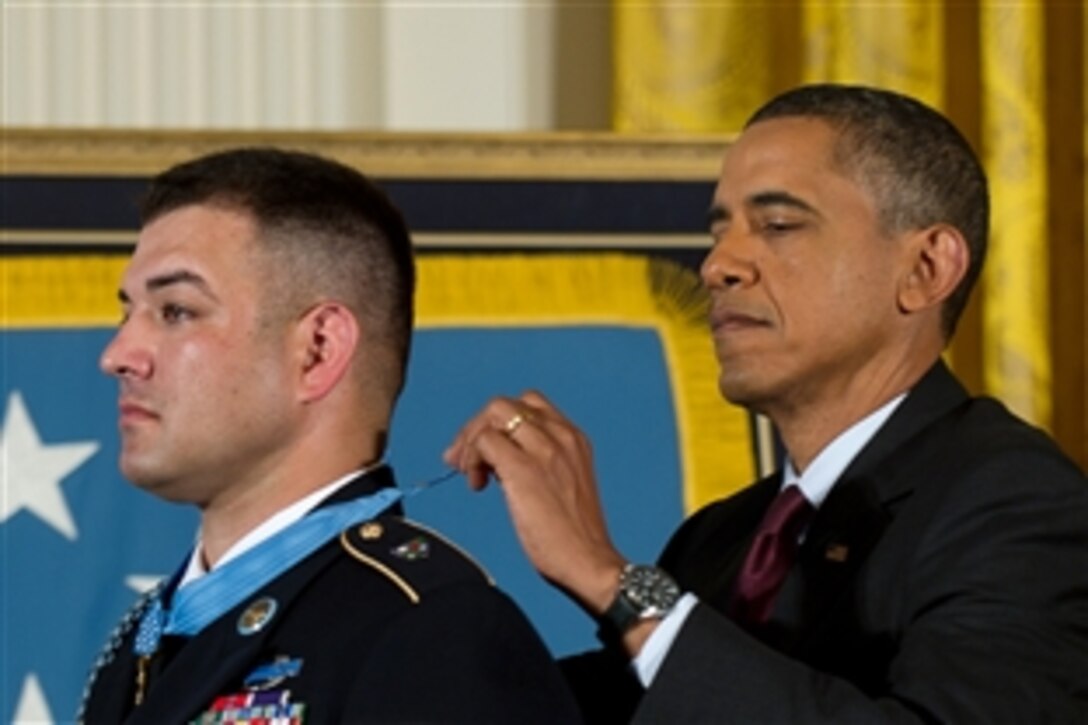 President Barack Obama awards Army Sgt. 1st Class Leroy Petry the Medal of Honor at the White House in Washington, D.C., July 12, 2011. 