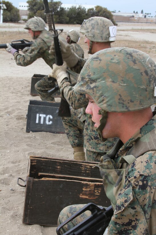 The sounds of gun fire and screaming filled the air as fully geared-up recruits from Company G, Marine Corps Recruit Depot San Diego, Calif., attacked the bayonet assault course July 12 with M-16A2 service rifles in hand.
