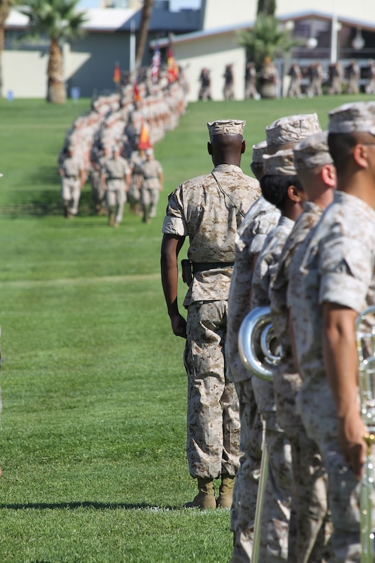 1st Lt. Brandon Shields, battalion adjutant, takes his place on Lance Cpl. Torrey L. Gray Field during the 3rd Battalion, 11th Marine Regiment, change of command ceremony July 13, 2011. The adjutant’s place on the field serves as a marker for the battalion to align with as they march onto the field.