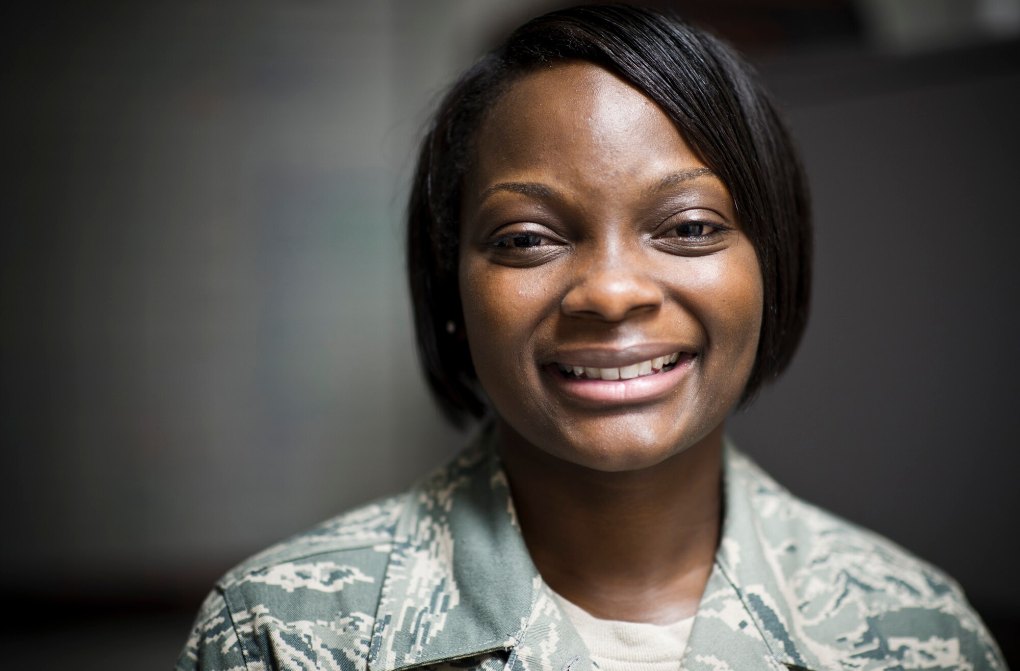 YOKOTA AIR BASE, Japan -- Staff Sgt. Raven Taylor, 374th Medical Operations Squadron medical technician, smiles for a photo at Yokota Air Base, Japan, July 8, 2011. Sergeant Taylor was named one of the Air Force's 12 Outstanding Airmen of the Year for 2011 for her work at her previous base, Eielson Air Force Base, Alaska. (U.S. Air Force photo/Staff Sgt. Samuel Morse)